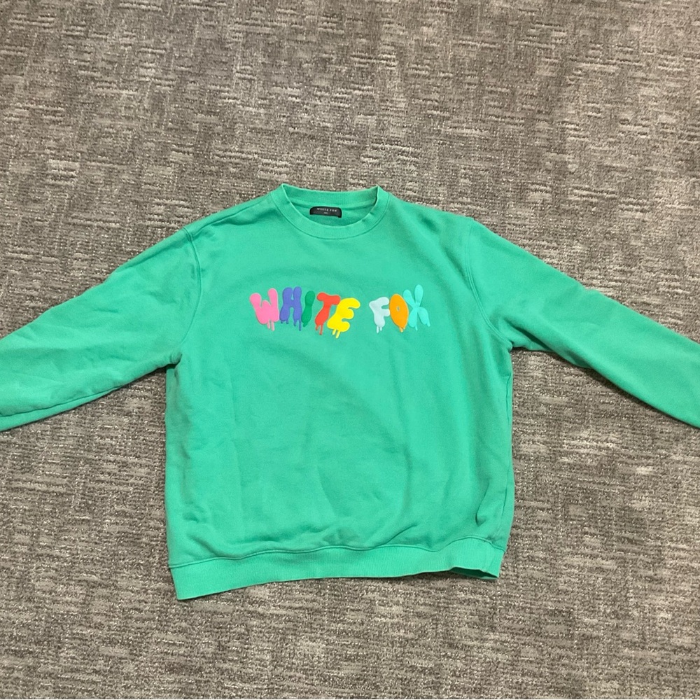 White Fox Boutique Green Sweatshirt with Multicolor Logo